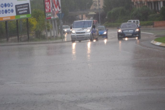 Coches Con Lluvia, Tráfico Urbano