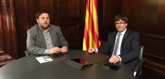 Oriol Junqueras, y Carles Puigdemont