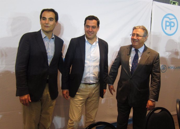 José Antonio Nieto con Juan Ignacio Zoido y Juanma Moreno