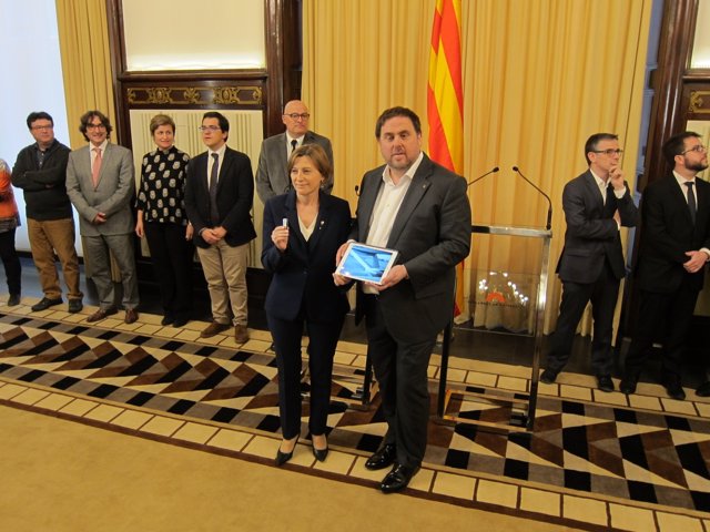 La presidenta del Parlament, C.Forcadell, y el conseller de Economía,O.Junqueras