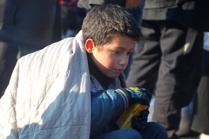 Un niño evacuado del este de Alepo