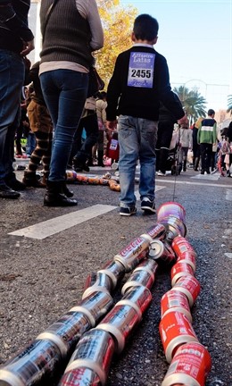 Arrastre de latas de Algeciras para llamar a los Reyes Magos