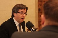 Puigdemont ve "posible" reunirse con Rajoy este mes e insistirá con el referéndum