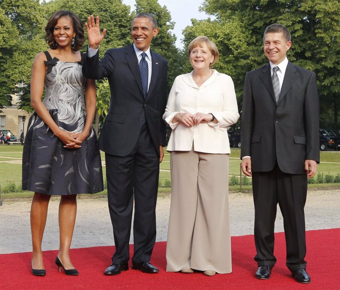 Barack Obama y Angela Merke junto con su mujer y marido, respectivamente