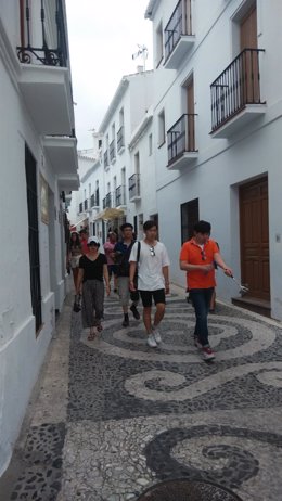 Turistas extranjeros.