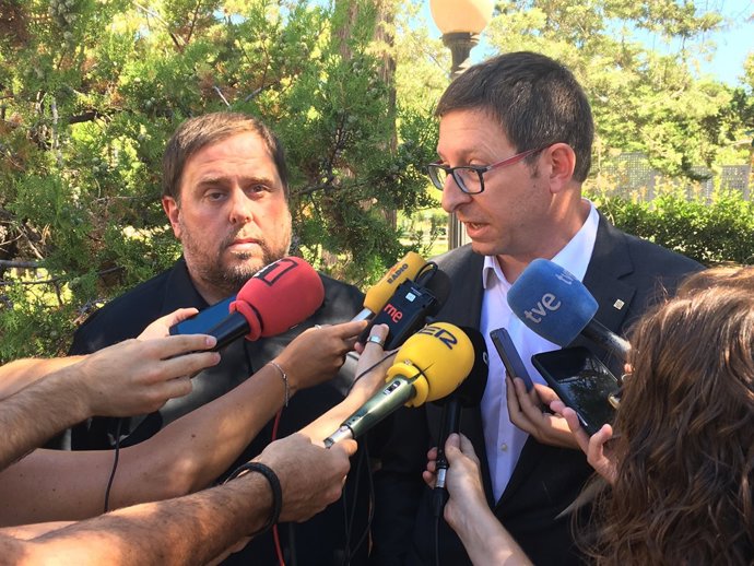 El vicepresident català, O.Junqueras, i el conseller de Justícia, C.Mundó