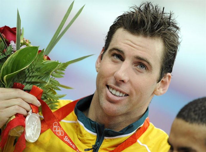Grant Hackett of Australia holds his silver medal for the men's 1500m freestyle 