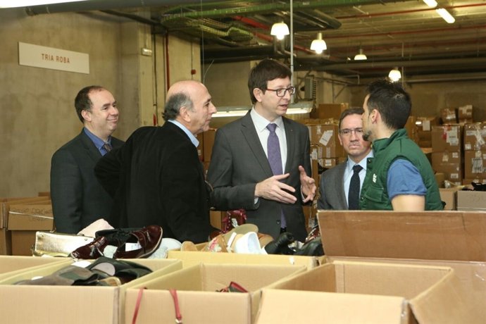 El conseller Carles Mundó i el director de la Fundació La Caixa Jaume Giró 