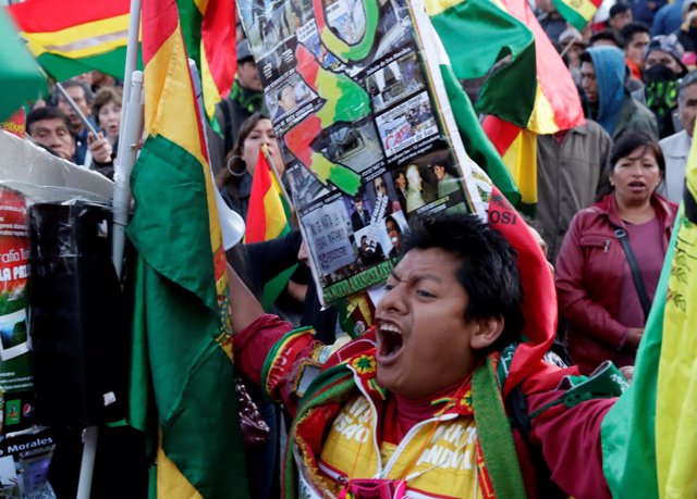 A demonstrator shouts slogans against Bolivia's President Evo Morales new re-ele