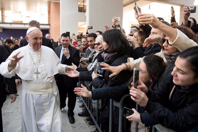 Pope Francis arrives to attend a meeting at the Roma Tre University in Rome, Ita