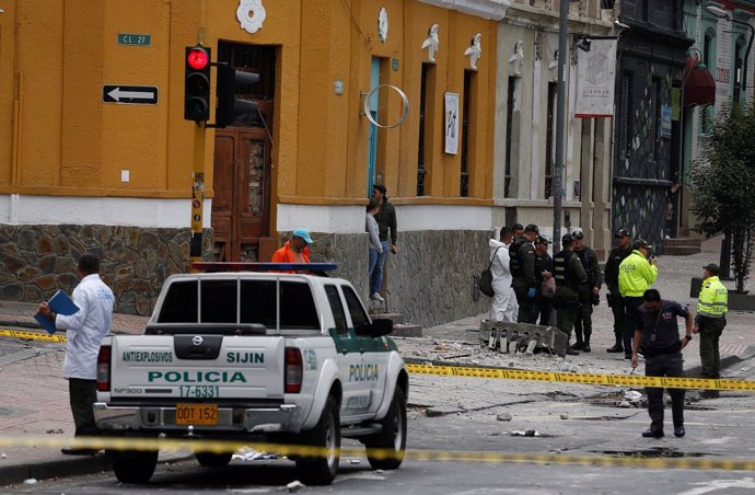 Police work the scene where an explosion occurred near Bogota's bullring, Colomb