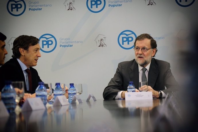 Rafael Hernando y Mariano Rajoy