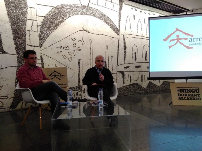 El director d'Arrels, Ferran Busquets, i el degà del Coac, Lluís Comerón