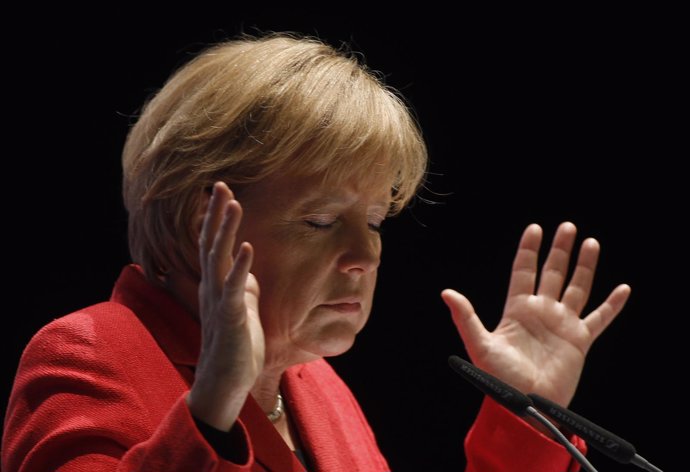 German Chancellor Angela Merkel gestures during a election campaign in the weste
