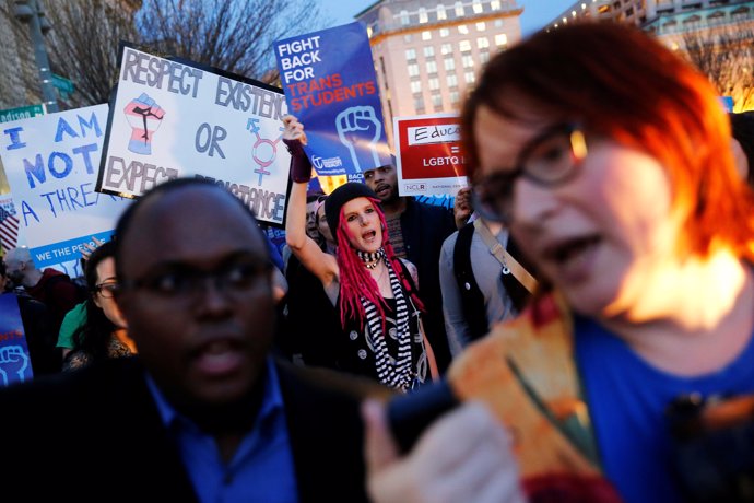 Transgender activists and supporters protest potential changes by the Trump admi