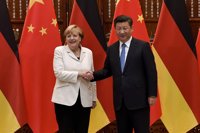 Merkel y Xi acuerdan sumar fuerzas para defender el libre comercio