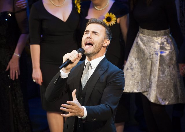 Gary Barlow performs live on stage during the press night of The Girls at the Ph
