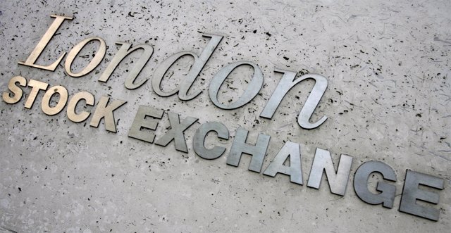 Signage is seen on the London Stock Exchange building in central London on May 2