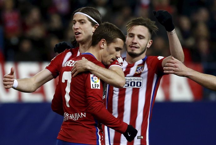 Griezmann, Saúl, y Filipe celebran un gol del Atlético