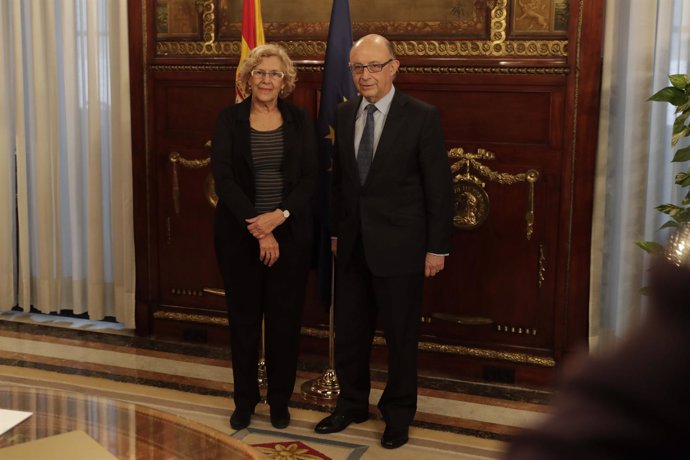 Carmena con el ministro de Hacienda Cristóbal Montoro