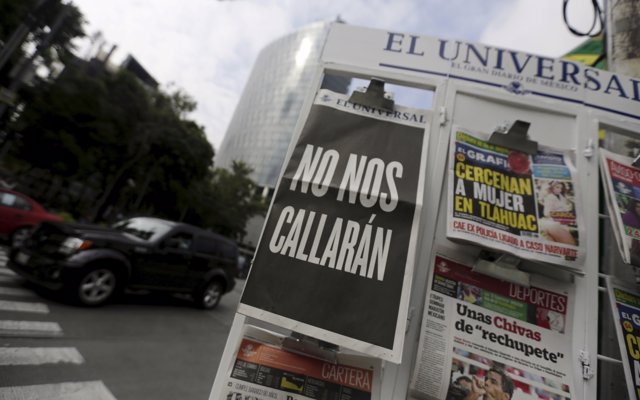 A copy of Mexico's leading daily El Universal newspaper is seen with a blackened