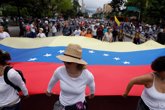 Foto: Chavismo y oposición salen a la calle para conmemorar el 1º de Mayo en Venezuela