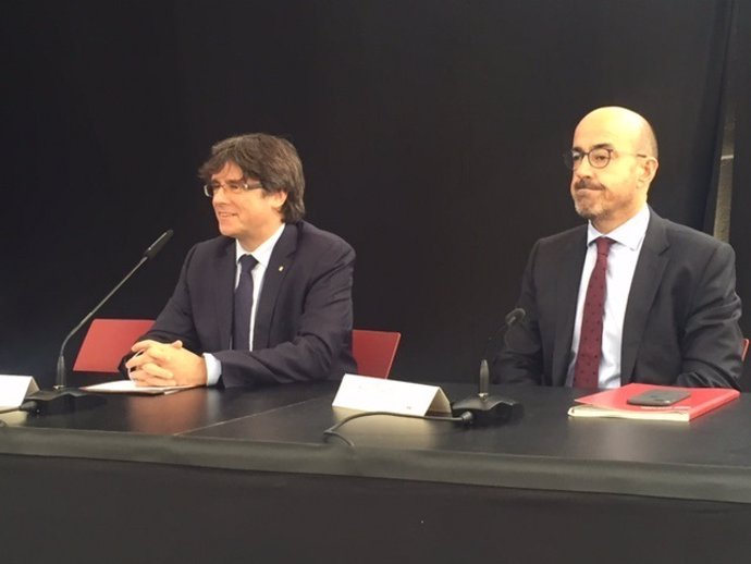 Carles Puigdemont (Generalitat) y J.A.García (CSC)