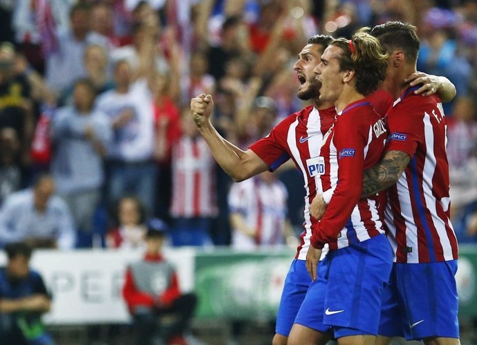 Koke, Griezmann y Fernando Torres 