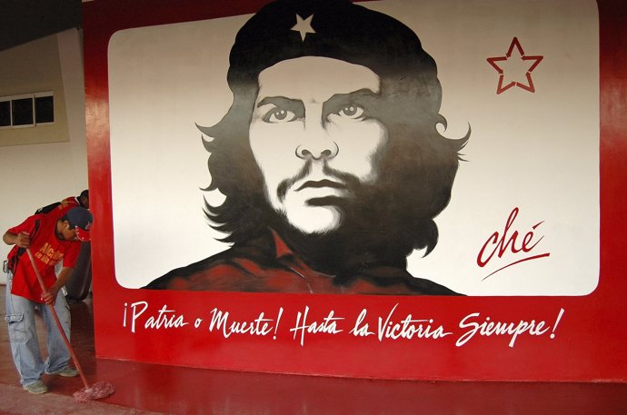 A painting of rebel hero Ernesto 'Che' Guevara  is seen outside a news conferenc