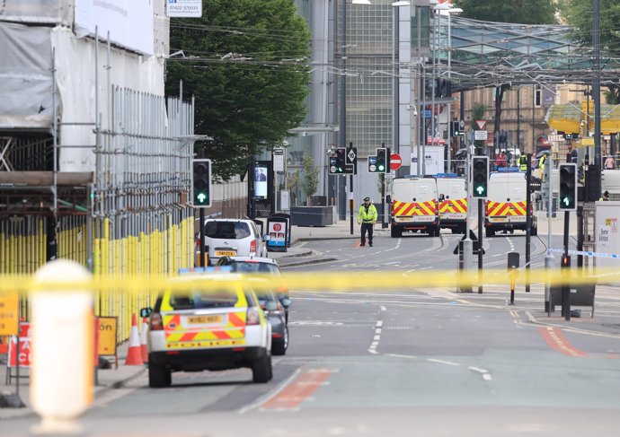 Police close to the Manchester Arena the morning after a suspected terrorist att