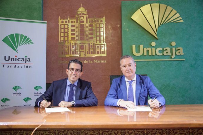 Unicaja colegio economistas málaga decano corral