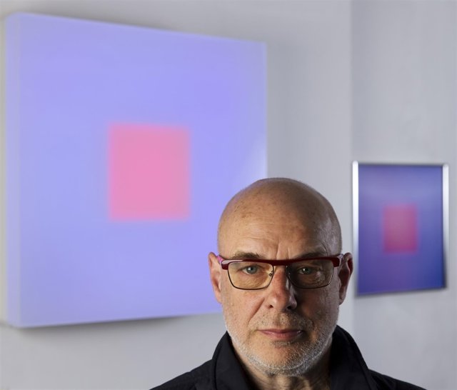 Brian Eno, musician and artist in his studio with lightbox and lenticular. April