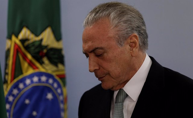 Brazil's President Michel Temer reacts as he speaks at the Planalto Palace in Br