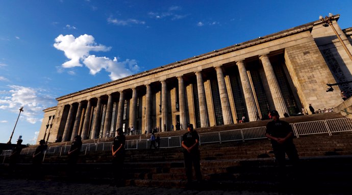Argentine policemen guard the entrance of the University of Buenos Aires' Law Sc