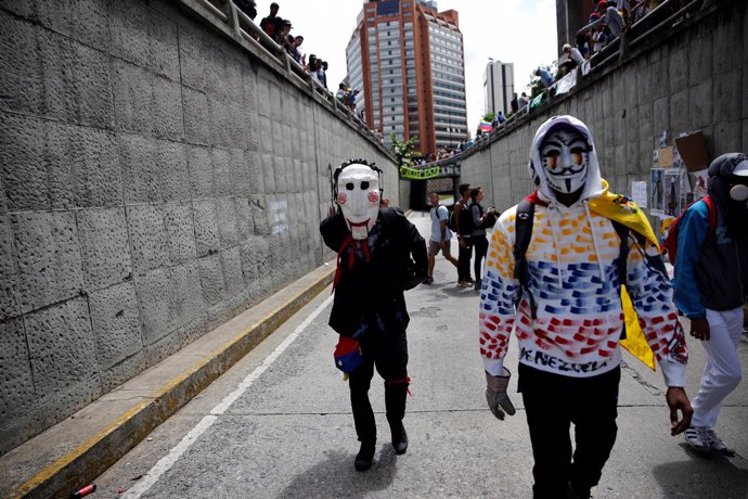 Opposition supporters rally against Venezuela's President Nicolas Maduro in Cara