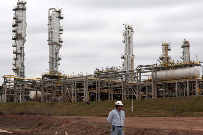A worker walks at the gas plant in Yacuiba, south of La Paz, August 24, 2015. Bo