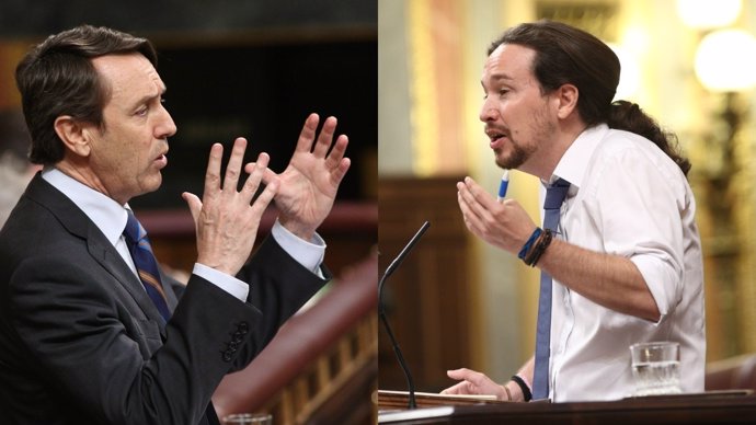 Rafael Hernando y Pablo Iglesias en el debate de la moción de censura