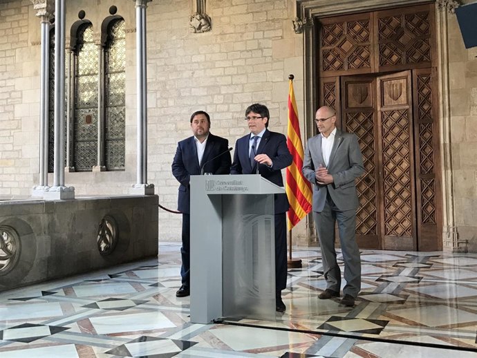 El pte. C.Puigdemont y los consellers O.Junqueras y R.Romeva