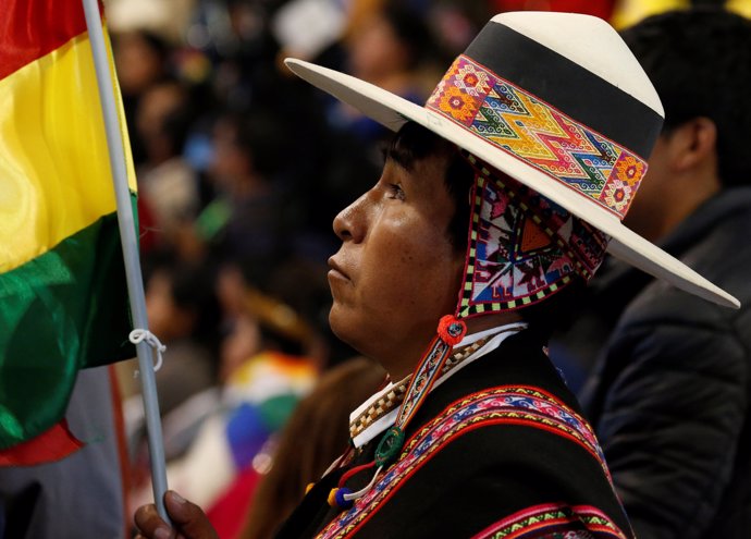 A participant attends the World People's Conference in Tiquipaya, Cochabamba, Bo