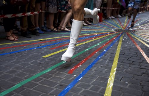 Contestants take part in the annual high heels race during Gay Pride celebration