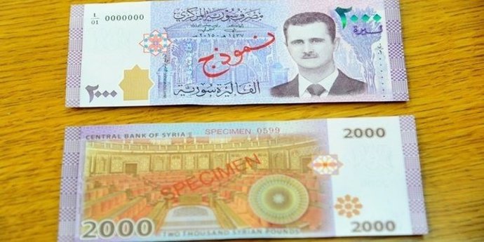 Nuevo billete de 2.000 libras sirias con el retrato de Al Assad