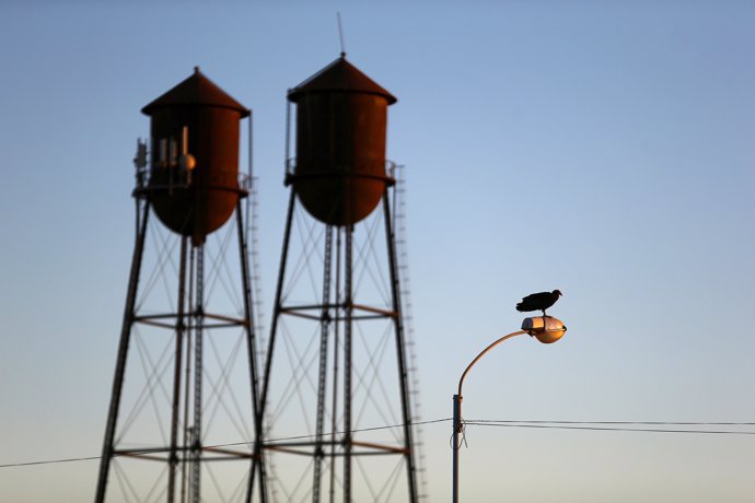 Old water towers are seen near a SQM nitrates plant in Maria Elena, northern Chi