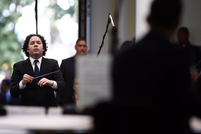 Venezuela's classical music superstar Gustavo Dudamel conducts a concert at the 