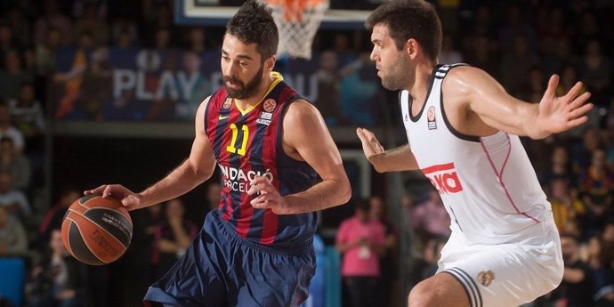 Navarro ante Reyes en el FC Barcelona-Real Madrid