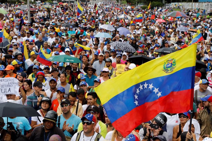 Opposition supporters attend a rally against Venezuelan President Nicolas Maduro