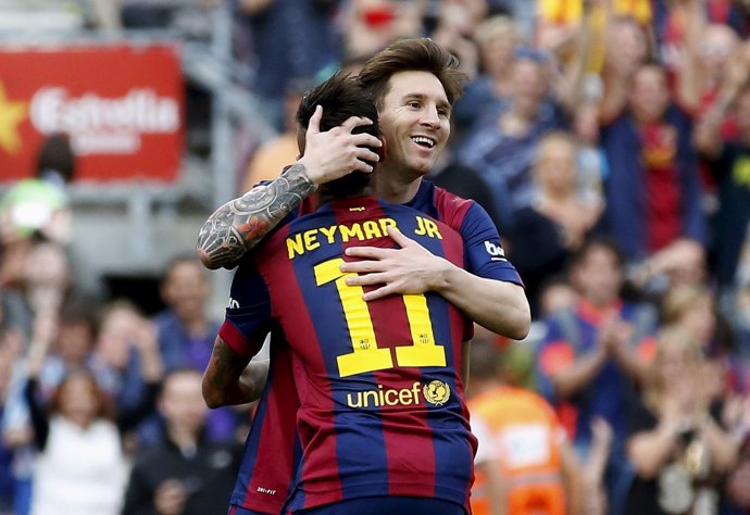 Barcelona's Lionel Messi celebrates his second goal against Deportivo de la Coru