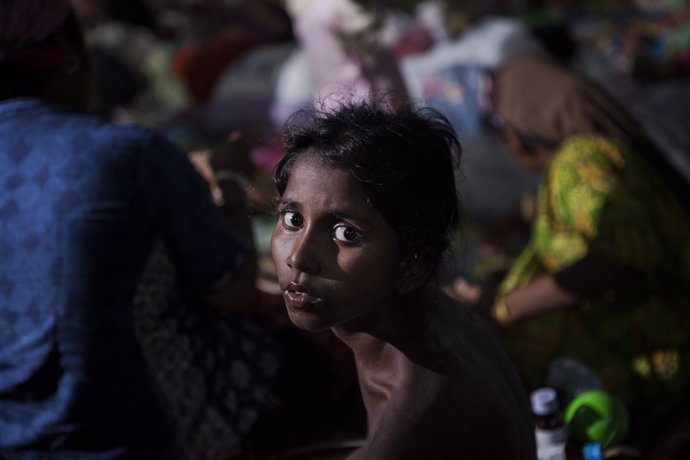 Nur Kaida, a Rohingya child from Myanmar is seen in a confinement area in Kuala 