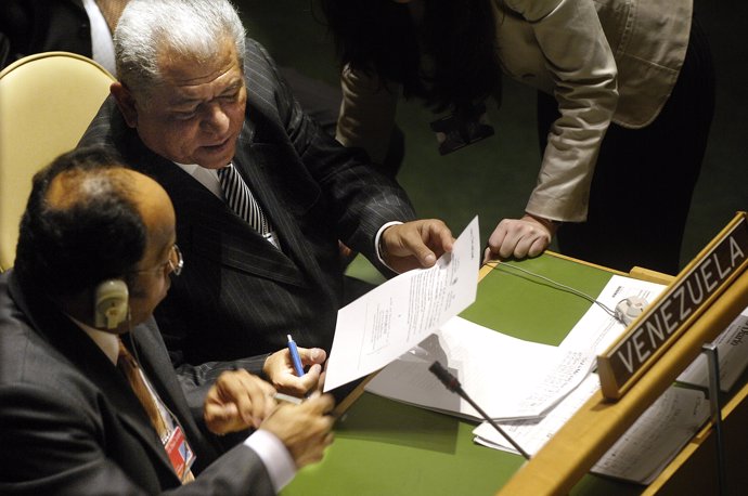 Venezuela's Deputy Foreign Minister Jorge Valero (top right) holds a ballot as t