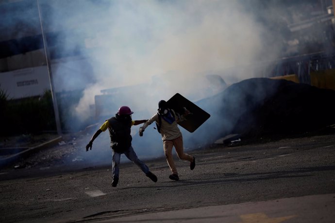 Disturbios durante la huelga opositora en Venezuela.
