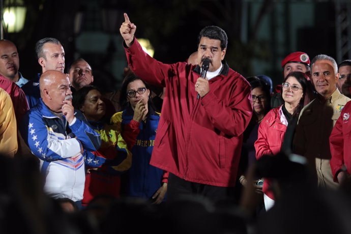 Venezuela's President Nicolas Maduro (C) speaks during a meeting with supporters